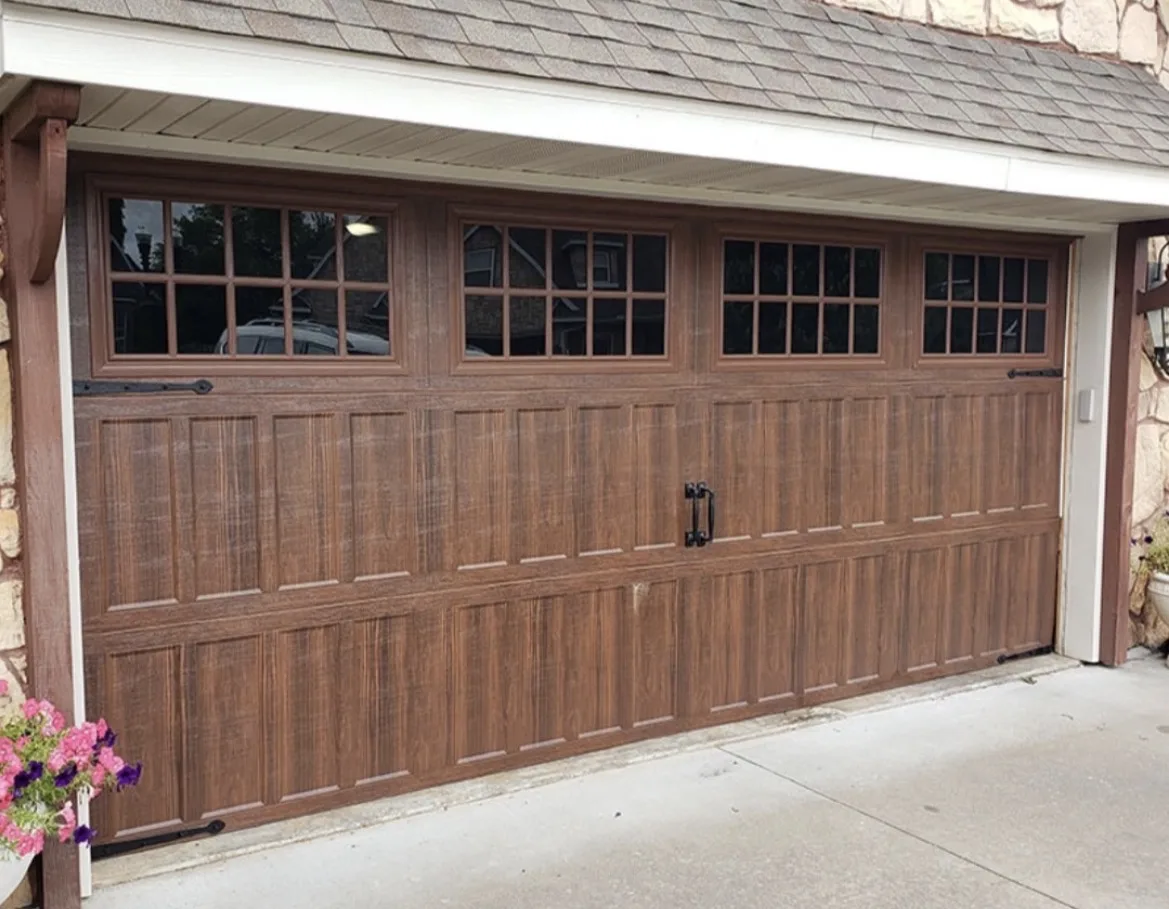 Classica garage door with woodgrain finish and carriage-style windows